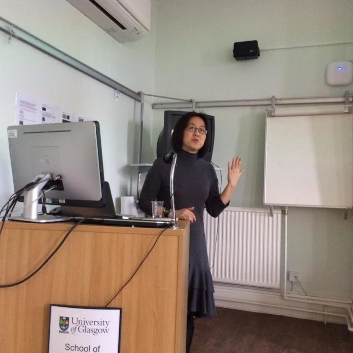 Brown research study corresponding author Yuka Sasaki speaks about her research at the University of Glasgow in Scotland earlier this spring. / TAKEO WATANABE/BROWN UNIVERSITY