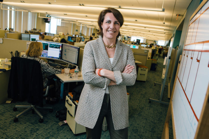 LEADING AND LISTENING: Samantha O'Neil is credited by colleagues at Fidelity for a leadership style that engages others and moves the organization forward. / PBN PHOTO/RUPERT WHITELEY
