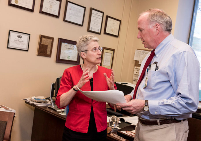 CREATING A NEW TOOL KIT: Dr. Angela M. Caliendo, University Medicine Foundation vice president, with foundation President Dr. Louis B. Rice, spearheaded the group's creation of a leadership academy for its physicians. / PBN PHOTO/MICHAEL SALERNO