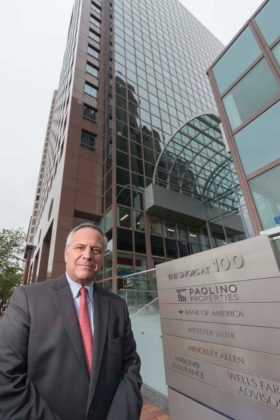 OUTSPOKEN: Former Mayor Joseph R. Paolino Jr. is seen in front of the headquarters of Paolino Properties in Providence. Paolino is critical of the city's new commercial property revaluation, which he said overstates the downtown's emergence from recession-era conditions. / PBN PHOTO/MICHAEL SALERNO