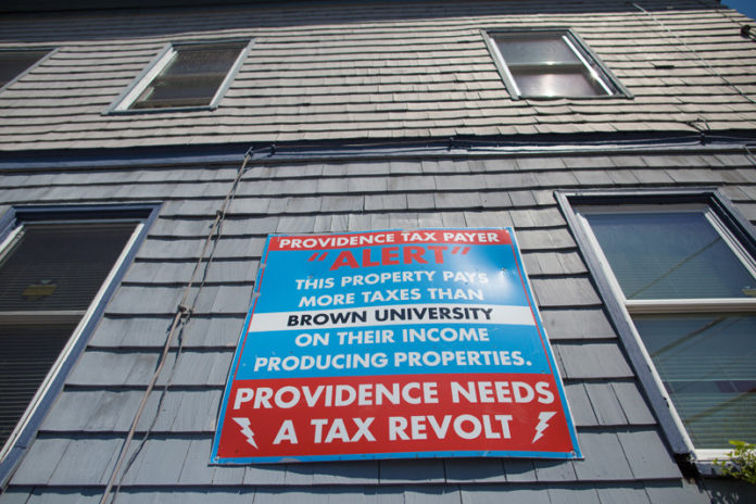 VISIBLE  FRUSTRATION: This sign appears on a three-apartment unit on Valley Street in the Smith Hill neighborhood of Providence. According to a Zillow.com posting, the property pays about $3,000 in taxes annually. / PBN PHOTO/ STEPHANIE EWENS