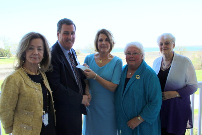 Jim Burke, Kent Hospital’s vice president of finance, second from left, accepts a donation from Kent Hospital’s Auxiliary members: Judy Laurence, Kent Hospital gift shop manager; Diane D. Scott, auxiliary president; Mary Jane Sweetland, auxiliary vice president and Marilyn Tarbox, auxiliary treasurer. / COURTESY KENT HOSPITAL