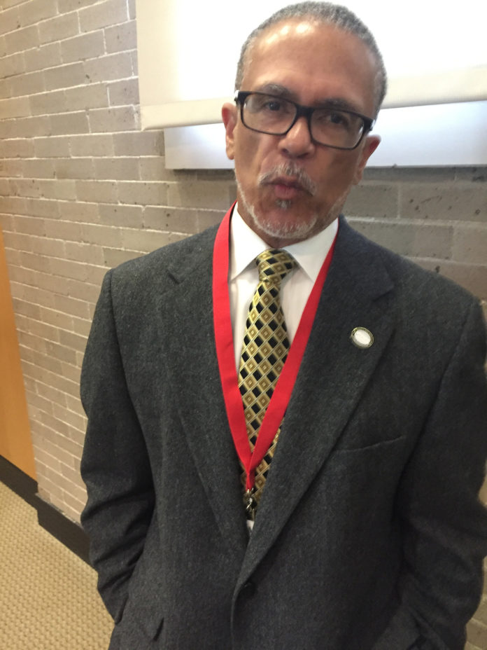 Dr. David Carlisle is seen before he spoke about the history of health care to an audience on May 28 at Brown University. / COURTESY NANCY KIRSCH