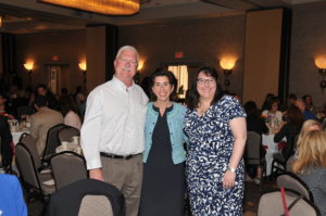 Kevin Wilcox and Career Achievement honoree Michelle Wilcox COO of Crossroads RI with Governor Gina Raimondo / Skorski Photography