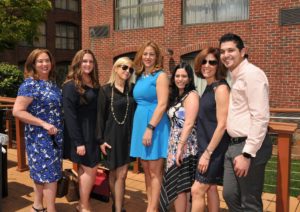 Women to Watch Honoree Stefanie Taylor, Gennaro (center) with friends and colleagues / Skorski Photography