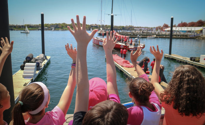 WHAT'S NEXT? Spectators in the Volvo Ocean Race Village watch one of the race boats leave the dock during its 2015 stop in Newport. In 2018, the round-the-globe race will come back to the City By The Sea for its only North American stop. / COURTESY VOLVO OCEAN RACE/CARMEN HIDALGO