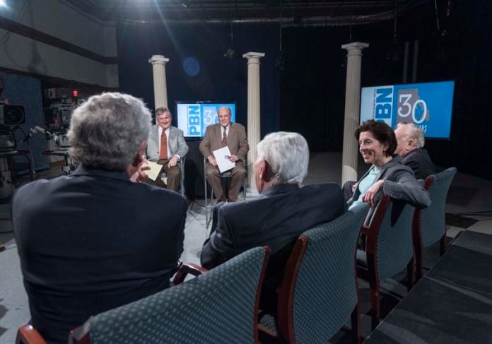 LET'S COMMUNICATE! WJAR-TV Anchor Frank Coletta and PBN Editor Mark S. Murphy, center left and right, spoke with Rhode Island governors about issues they have faced and continue to face and what is best to move the state forward. Foreground, from left, Govs. Donald L. Carcieri, Lincoln C. Almond, Gina M. Raimondo, Edward D. DiPrete. / PBN PHOTOS/ MICHAEL  SALERNO