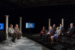 FROM MANY, ONE VOICE: Business leaders agreed that education is a needed investment in the state's economic future, while government must do a better job at understanding businesses' needs. Moderating the discussion, from left, WJAR-TV Anchor Frank Coletta and PBN Editor Mark S. Murphy. Seated, from left, Anna Cano Morales, Neil D. Steinberg, Alan H. Litwin, Sandra J. Pattie, Nick Kishfy and Michael E. McKelvy. / PBN PHOTOS/ RUPERT  WHITELEY