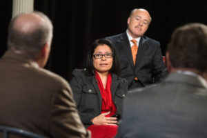 Locally  Diverse: Anno Cano Morales, director of the Latino Policy Institute, noted that communities of color are the majority in many local cities and towns. Behind her is Kahn, Litwin & Renza Co. Managing Director Alan H. Litwin.
