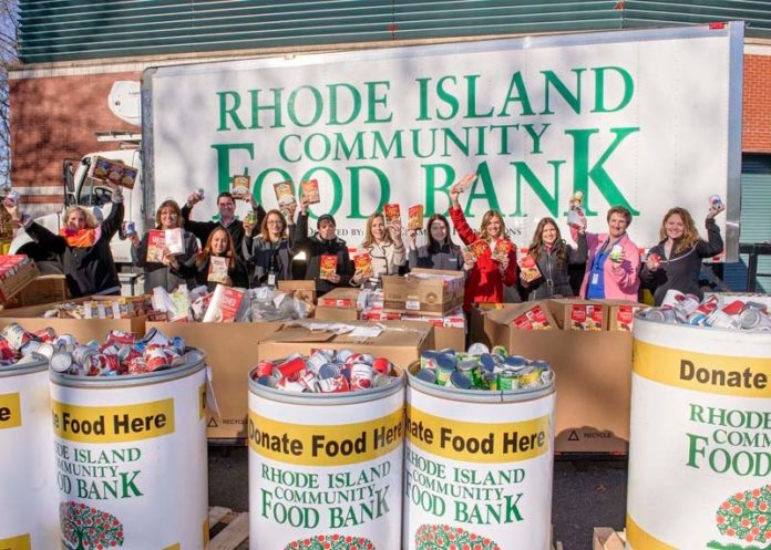 FULLY ENGAGED: Amica employees helped to support the Rhode Island Community Food Bank in 2015. / COURTESY AMICA