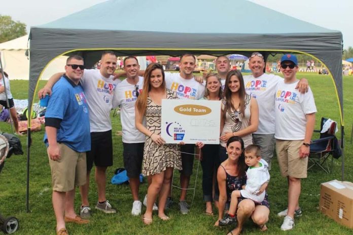 DEDICATED TO A CAUSE: Cintas employees took part in the American Cancer Society's 2015 Hope Relay for Life. / COURTESY CINTAS