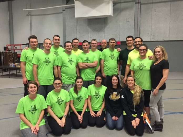 CIPHERING FOR A CAUSE: KLR staff "Olympians" competed in the annual Accounting Olympics to benefit the Women's Center of Rhode Island. / COURTESY KLR