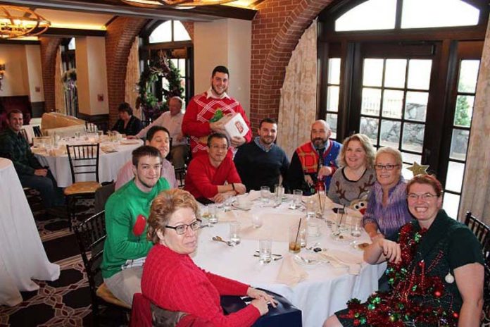 MOMENT OF APPRECIATION: Providence Mutual Fire Insurance holds various events to show staff they are valued, including this 2015 holiday party at Chapel Grille in Cranston. / COURTESY PROVIDENCE MUTUAL FIRE INSURANCE
