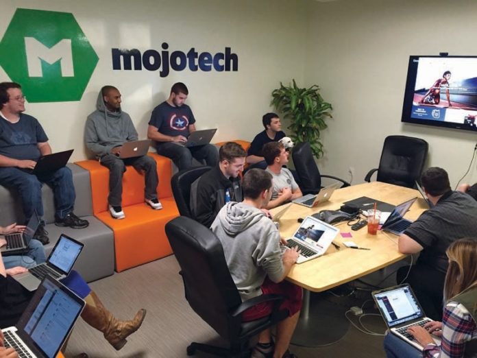 GROUP EFFORT: From a team approach to social events, to on-site training, MojoTech looks to build a staff that believes in the company mission. / PHOTO COURTESY MOJOTECH