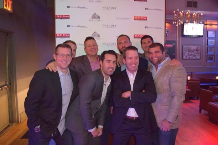 PROMOTING TOGETHERNESS: DarrowEverett recently opened a New York office, so to celebrate – and to connect better with clients – the firm held a holiday party there. / COURTESY DARROWEVERETT