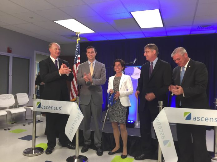 OFFICIALS CELEBRATE the opening of Ascensus' new office in Warwick on Monday. From left to right, Jeff Howkins, president and CEO of Ascensus College Savings; General Treasurer Seth Magaziner; Gov. Gina M. Raimondo; Bob Guillocheau, president and CEO, Ascensus Inc.; and Warwick Mayor Scott Avedisian. / COURTESY TRUE NORTH COMMUNICATIONS