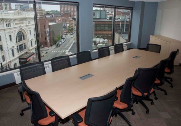 ROOM WITH A VIEW: This fifth-floor conference room, angled to take advantage of the view of the ornate Trinity Repertory Company theater, is shared by the School of Continuing Studies and the School of Justice Studies, Outreach and Engagement.