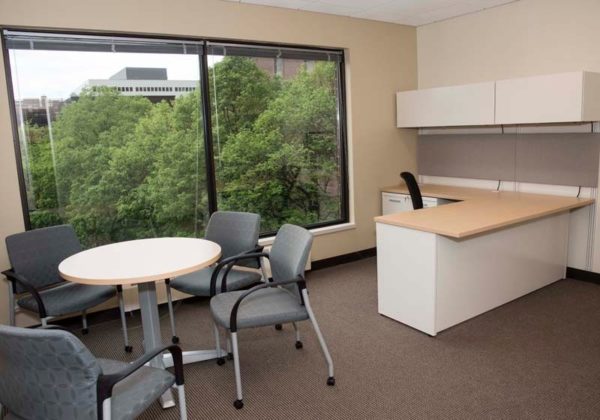 MEETING NEEDS: This office and private conference and meeting space for the Feinstein Law Clinic of the School of Law overlooks the building entrance and courtyard.