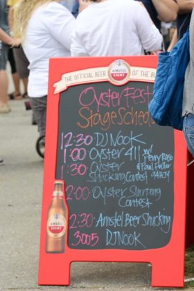 VALUABLE PEARL: A sign advertises the oyster specials at the 2015 Great Chowder Cook-off. The annual festival is a popular draw for Newport and is just one example of the state's potential for culinary tourism. / COURTESY DISCOVER NEWPORT