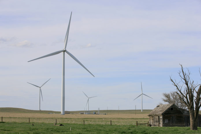 BIG INSTITUTIONS - such as the U.S. armed forces - are signing deals for renewable energy, much of it the result of growing wind energy farms in the Great Plains, including the Colorado Highlands Wind Farm in Fleming, Colo. / BLOOMBERG NEWS PHOTO/MATTHEW STAVER