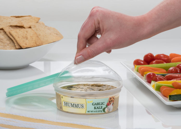 Toray Plastics (America) Inc. has created a new LumiLid anti-fog, clear-lidding film for use with polypropylene food trays, such as this hummus container. / COURTESY TORAY