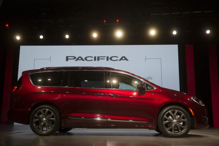 FIAT CHRYSLER AUTOMOBILES, maker of the Chrysler Pacifica, among other models, is offering prizes of up to $1,500 to "good-guy hackers" who help the company find vulnerabilities in software installed in its vehicles. / BLOOMBERG NEWS PHOTO/ANDREW HARRER