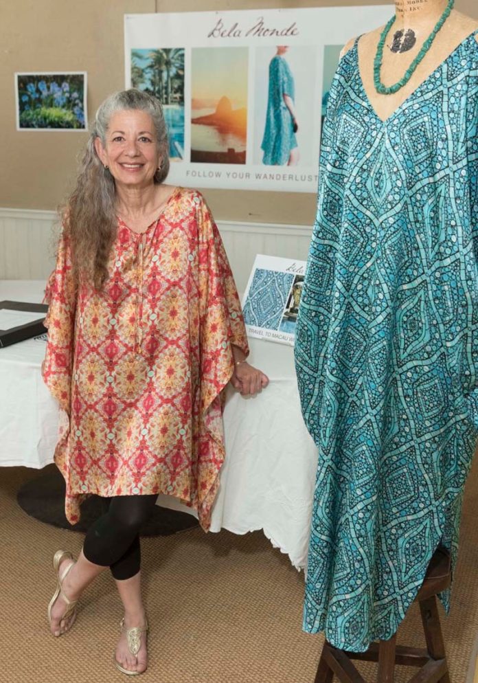 WEARABLE ART: Lisa Limer, owner of Bela Monde Studio in Providence, displays her silk creations. The patterns are produced digitally from her professional photographs and printed on fabric. / PBN PHOTO/MICHAEL SALERNO