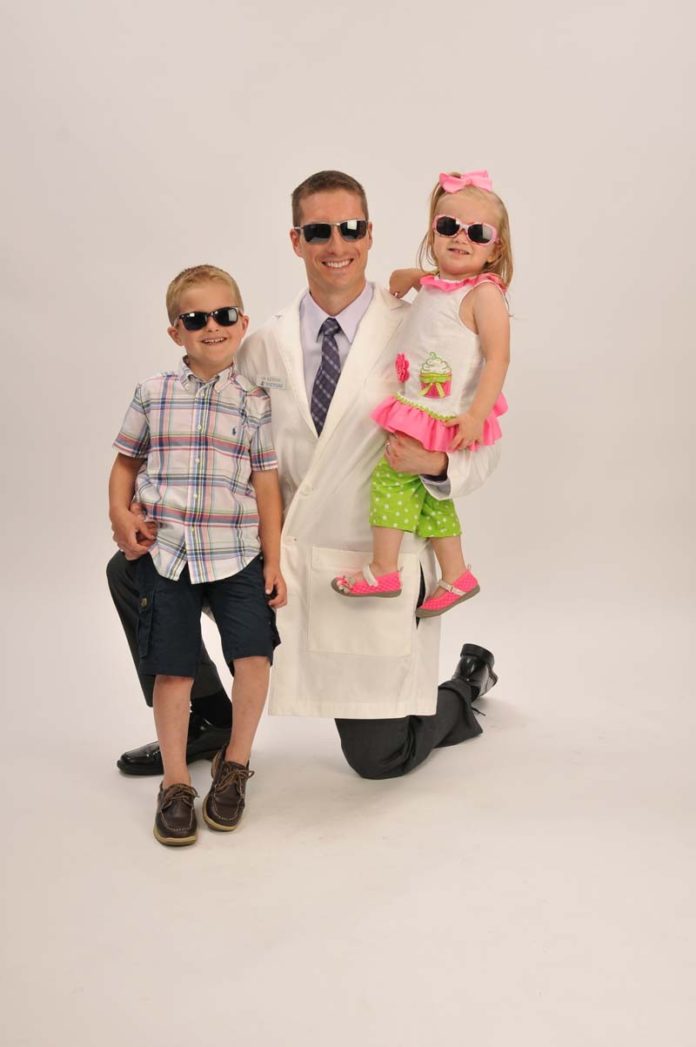 The Prop: Jeffrey S. Kenyon may spend most of his time in his doctor's jacket, but his children Isla, 2, and Mason, 5, are never far from reach.