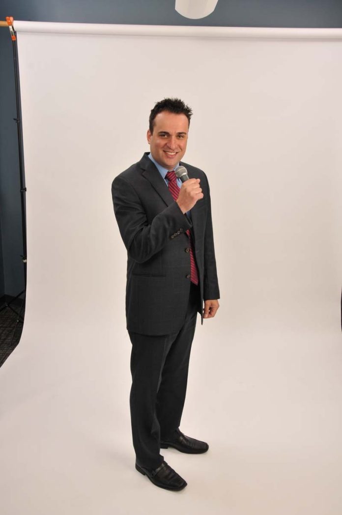 The Prop: Sergio E. Sousa can be found with a microphone in hand, either for professionally announcing winners at the casino or for letting loose during karaoke.