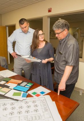 INITIATIVE: From left, Brian Krug, account executive at W B. Mason Co., Elizabeth Scott Beaulieu, interior designer, and Joe Rando, president and CEO at Trade Area Systems, which is moving from Attleboro to Providence in the fall. / PBN PHOTO/TRACY JENKINS