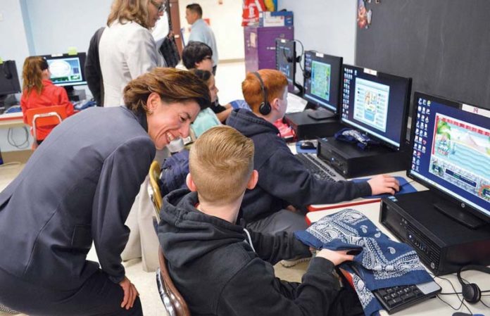 LAYING THE GROUNDWORK: In March, shortly after launching a computer science initiative, Gov. Gina M. Raimondo spoke to students enrolled in a Google-supported class at Edward R. Martin Middle School in East Providence. / COURTESY  OFFICE OF  GOV. GINA M. RAIMONDO