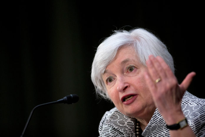 INVESTORS WILL listen closely for additional clues on timing of an interest rate increase when Fed Chair Janet Yellen speaks Aug. 26 at an annual symposium hosted by the Kansas City Fed in Jackson Hole, Wyo. / BLOOMBERG NEWS FILE PHOTO/ANDREW HARRER