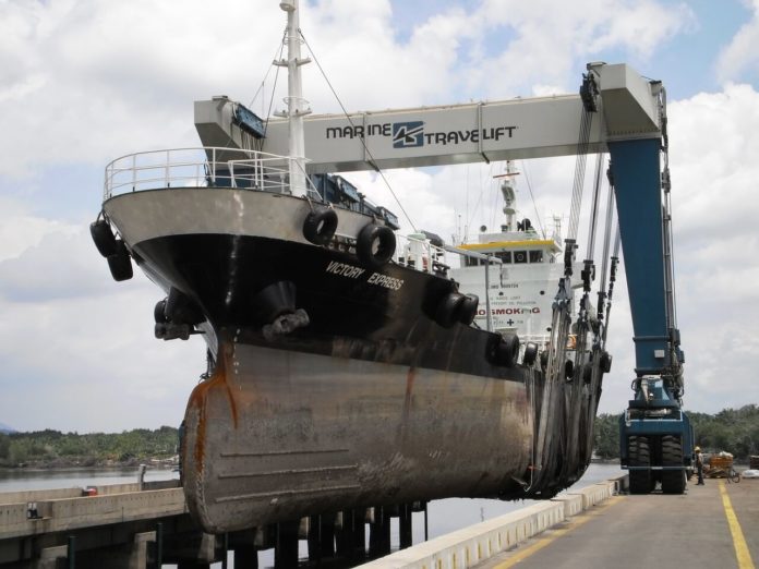 J. GOODISON CO. is expanding its marine services business onto a newly improved, waterfront site at the Quonset Business Park, and with a new mobile ship hoist, will begin servicing vessels as large as barges and passenger ferries. Pictured is the mobile ship hoist. / COURTESY J. GOODISON CO.