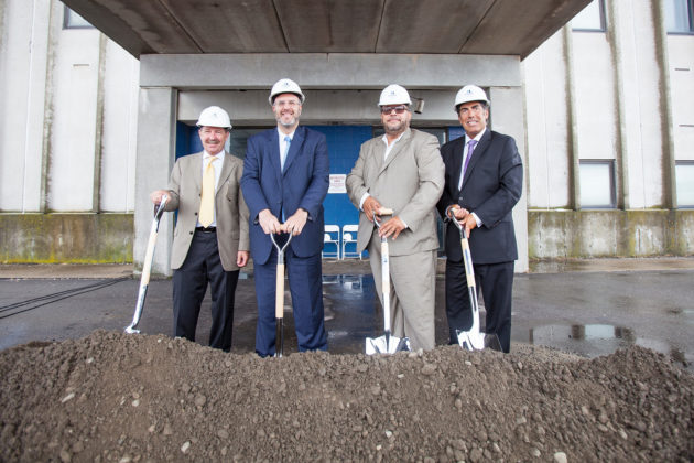 FROM LEFT TO RIGHT, Jim Braselton, senior vice president of marketing, sales and distribution for McInnis Cement; R.I. Commerce Secretary Stefan Pryor; Providence City Council President Luis A. Aponte and ProvPort Board Chair Paul Moura are shown at the groundbreaking ceremony for McInnis Cement's $22 million cement terminal project at the Port of Providence on Tuesday. The picture was taken outside McInnis&rsquo;s facility at the port. / COURTESY MCINNIS CEMENT
