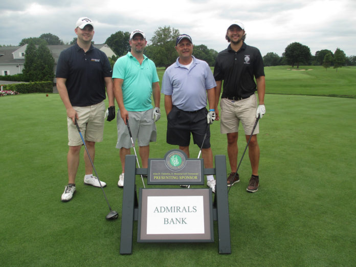 Admirals Bank foursome Joe Schleifer, Jon Botts, Eric Schwartz and Riley McDermott  are seen at the Providence Children’s Museum’s 33rd annual Allen H. Chatterton Jr. Memorial Golf Tournament held on Aug. 1 at the Wannamoisett Country Club in East Providence. / COURTESY PROVIDENCE CHILDREN'S MUSEUM