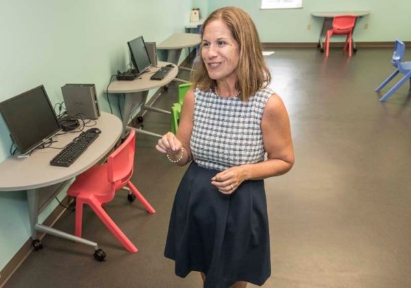 LOOKING AHEAD: Erin Gilliatt, executive director, stands in the computer lab, which has four computer terminals and a nook that she plans to use for another purpose, perhaps 3-D printing.
