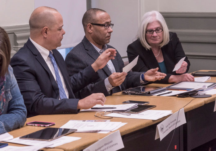 A REPORT COMMISSIONED BY Providence City Council found there is much to improve in the operations of the city's Licensing Board. Members pf the board during a winter meeting included, from left, Juan M. Pichardo, chairman, Luis Peralta, commissioner and Johanna Harris, commissioner. / PBN FILE PHOTO/MICHAEL SALERNO