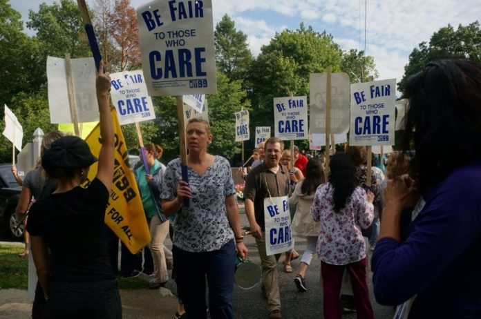 Employees from Butler Hospital and Women & Infants Hospital held a protest Sept. 1 outside Butler Hospital in Providence. / COURTESY NANCY KIRSCH