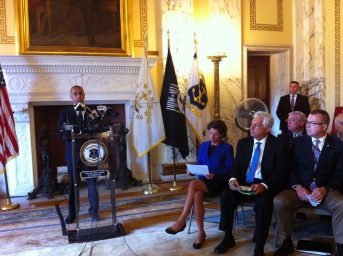 PROVIDENCE MAYOR Jorge O. Elorza speaks at a press conference on Wednesday at the Statehouse about the reconstruction of the Route 6 and 10 interchange. Gov. Gina M. Raimondo is seen on the right, next to R.I. Department of Transportation Director Peter Alviti Jr. / PBN PHOTO/MARY MACDONALD