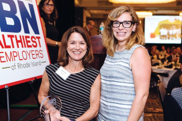 Preventure&rsquo;s Cindy Butts and Morgan Glade accept their Healthiest Employee award 