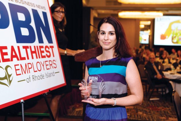 Health and Wellness Coordinator Christine DaCosta accepts the award for Dave&rsquo;s Marketplace