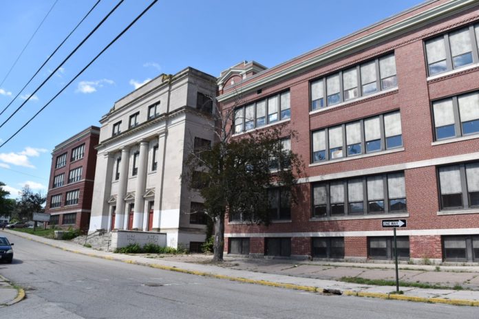 The former Woonsocket Middle School, an attached configuration of four buildings, is the subject of a request for redevelopment proposals. / COURTESY CITY OF WOONSOCKET