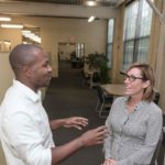5Q: Lara Salamano COLLABORATIVE EFFORT: Lara Salamano, the new chief marketing officer for R.I. Commerce Corp., speaks with Jay Johnson, director of business attraction. / PBN PHOTO/MICHAEL SALERNO