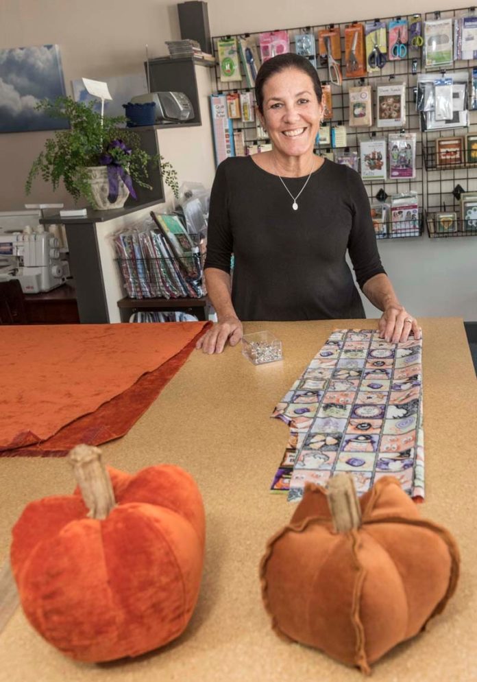 SEWING CIRCLE: Suzanne Mancini, owner of The-Sew-Op, located in North Kingstown, offers sewing instruction for every level. / PBN PHOTO/MICHAEL SALERNO