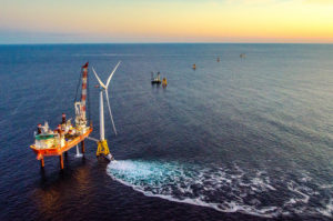 COASTAL NEIGHBOR: Deepwater Wind's five-turbine offshore wind farm was erected less than three miles off the southeast coast of Block Island. / COURTESY DEEPWATER WIND
