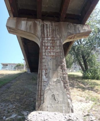 DECAYING SUPPORT: This reinforced concrete support structure for the Tobey Street on-ramp to Route 6 West shows years of decay. The rebar is exposed. / COURTESY R.I. DEPARTMENT  OF TRANSPORTATION