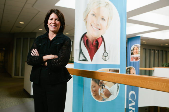 CVS HEALTH CORP. Executive Vice President and CVS Pharmacy President Helena B. Foulkes said the company is "very pleased to announce that we will be partnering with OptumRx, which will allow us to explore innovative ways of helping patients on their path to better health.”  / PBN FILE PHOTO/RUPERT WHITELEY