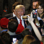 U.S. President-elect Donald Trump, center, greets attendees during an election night party at the Hilton Midtown hotel in New York on Wednesday, Nov. 9. Trump was elected the 45th president of the United States in a repudiation of the political establishment that jolted financial markets and likely will reorder the nation's priorities and fundamentally alter America's relationship with the world. / BLOOMBERG NEWS/ANDREW HARRER