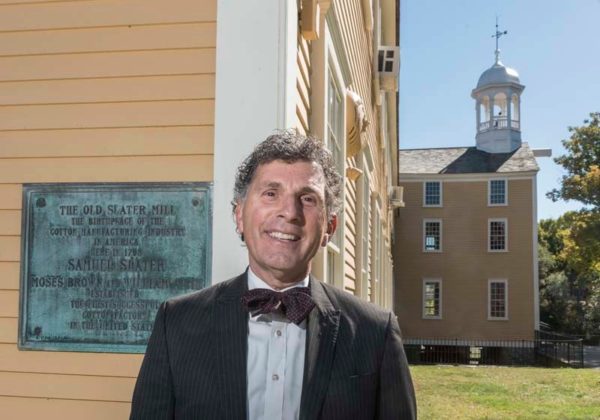NEW PARK: Blackstone River Valley Tourism Council President Bob  Billington, in front of the mill recognized as part of Blackstone River Valley National Historical Park. / PBN PHOTO/MICHAEL SALERNO