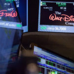 S&P 500 halts rally, small caps surge as election winners sought WALT DISNEY Co., signage is displayed on the floor of the New York Stock Exchange in New York on Friday, Nov. 11. U.S. stocks fluctuated in whipsaw trading, with the Dow Jones Industrial Average spinning near a record, as investors speculate how Donald Trump's policies will impact the economy and interest rates. Small caps headed for the best weekly gain in five years. / BLOOMBERG NEWS PHOTO/MICHAEL NAGLE
